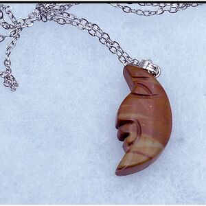 Vintage carved semi precious stone  cresant moon face necklace